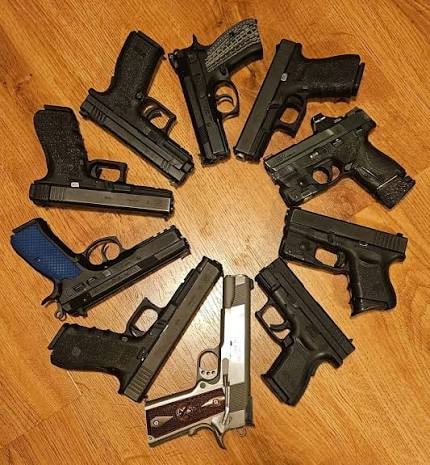 Firearm collection arranged in a circle